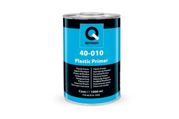 Silver automotive metal can, Q-Refinish 40-010 Plastic Primer, grey and black horizontal label, white background, studio photography
